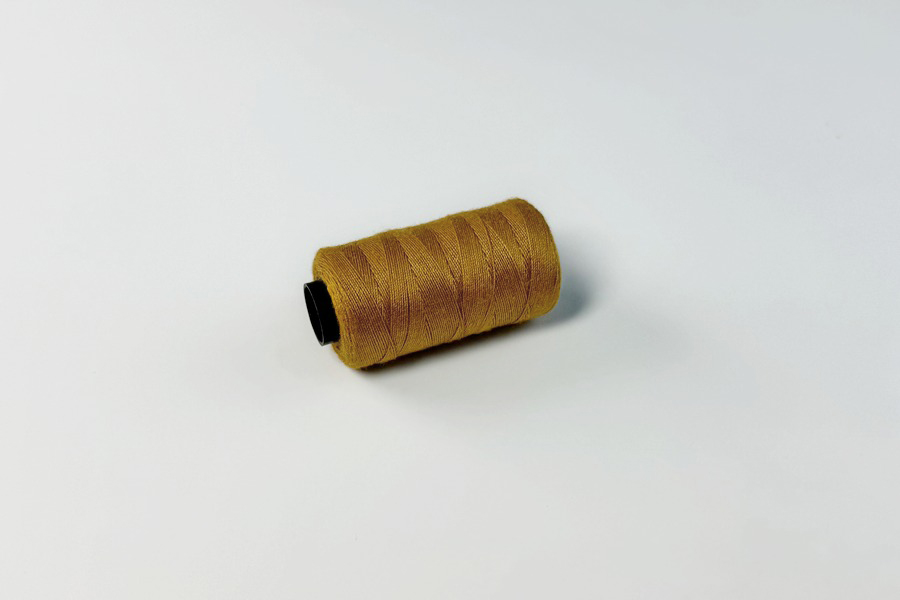 Нитки швейні №20/3 джинс поліестер 100% золотистий 150 м 7032