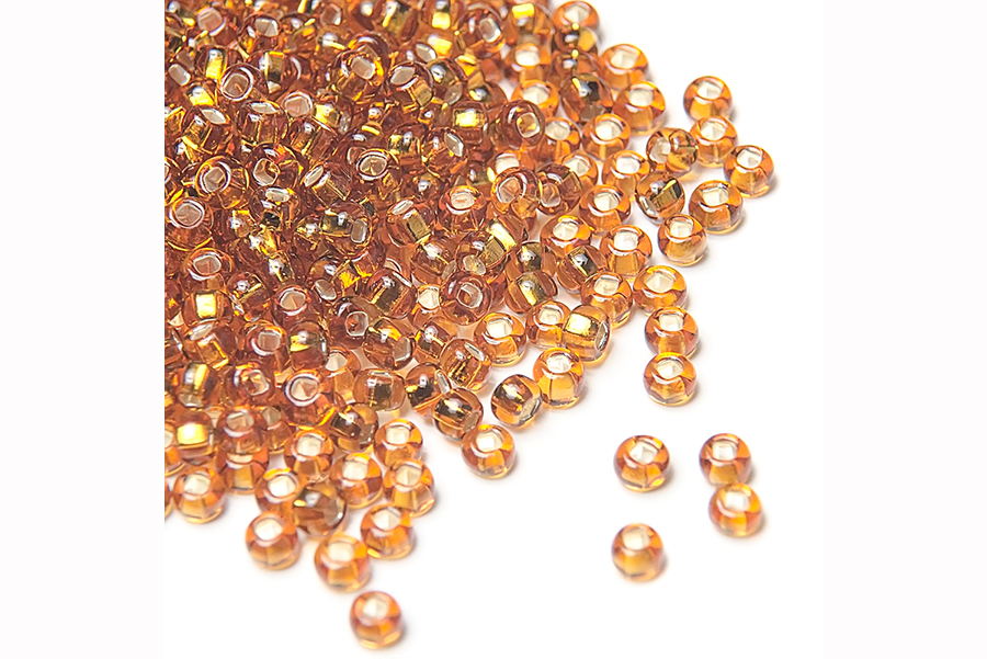 Бісер Preciosa 17090 №10 прозорий срібляста серединка золотистий коричневий 2,3 мм