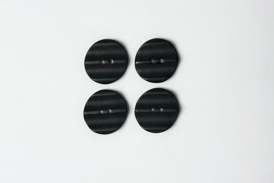 Гудзик 25 мм 4 отвори фактурний