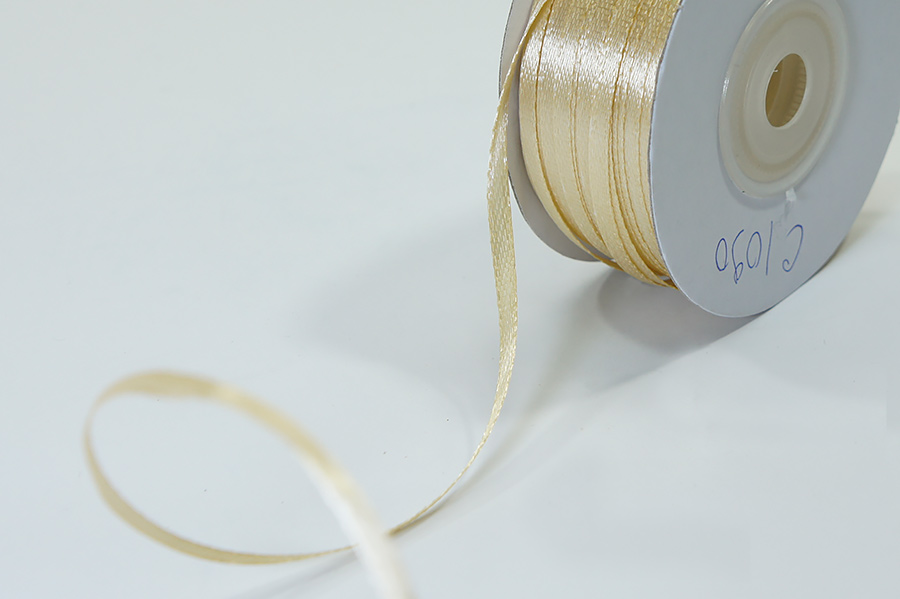 Стрічка на катушці 3 мм MH бежевий золотистий