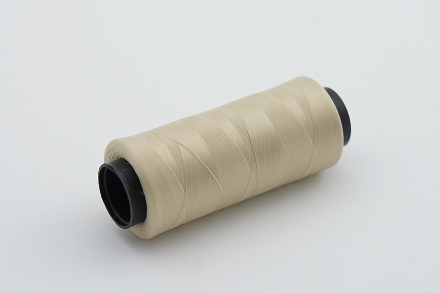 Нитки швейні 150D Barva текстуровані поліестер 100% бежевий 500 м 007T