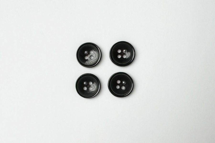 Гудзик 15 мм Mertbutton 4 отвори фактурний коричневий темний 3107-24-0261