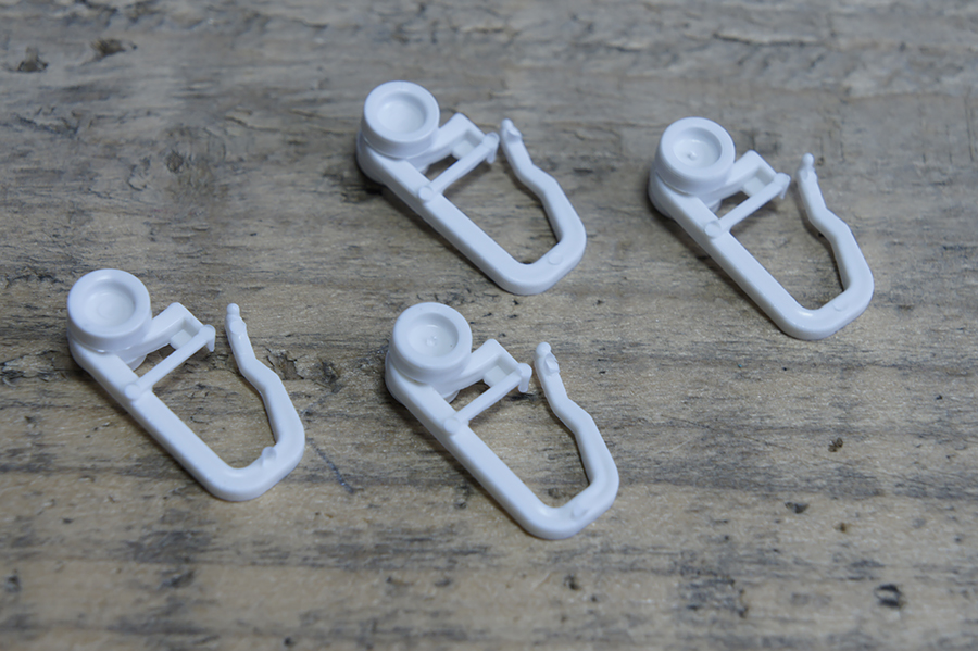 Гачок для карниза з роликом