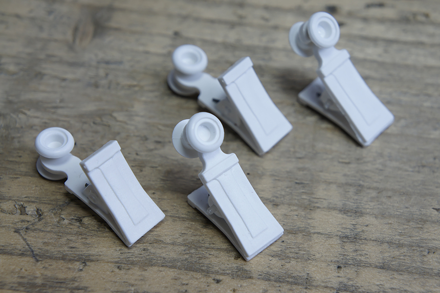 Затискач для штор з роликом білий 3007-01-50