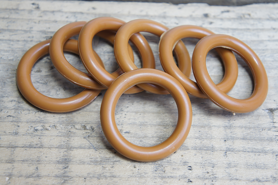 Кільце 33 мм пластикове рудий