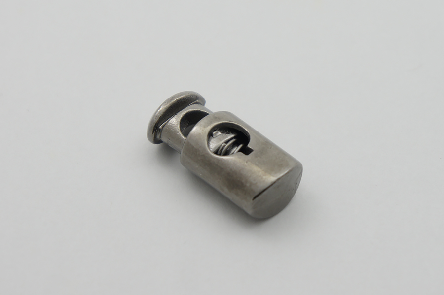 Фіксатор для шнура Mertbutton одинарний нікель чорний 12х25 мм