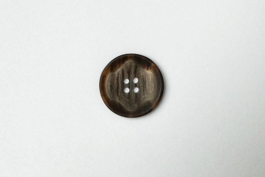 Гудзик 25 мм Mertbutton 4 отвори фактурний коричневий темний