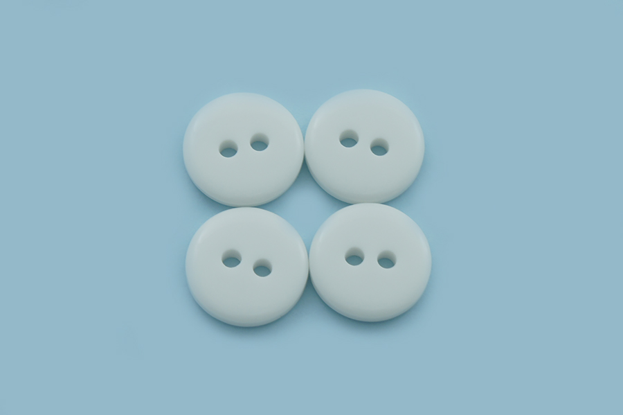 Гудзик 13 мм Mertbutton 2 отвори глянець білий