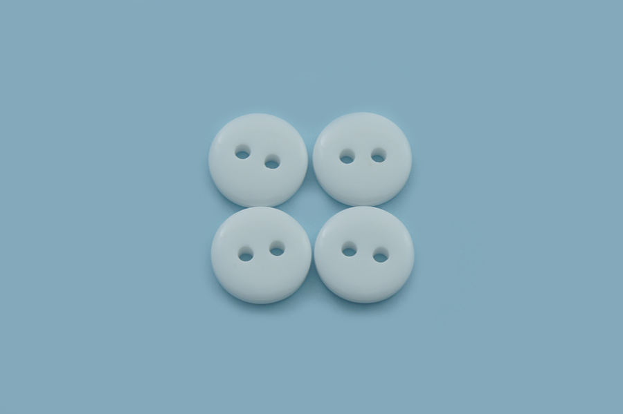 Гудзик 11 мм MH 2 отвори однотонний білий