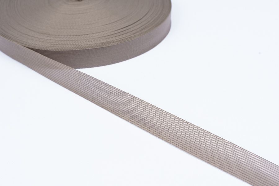 Тасьма 23 мм в'язана молочний сірий