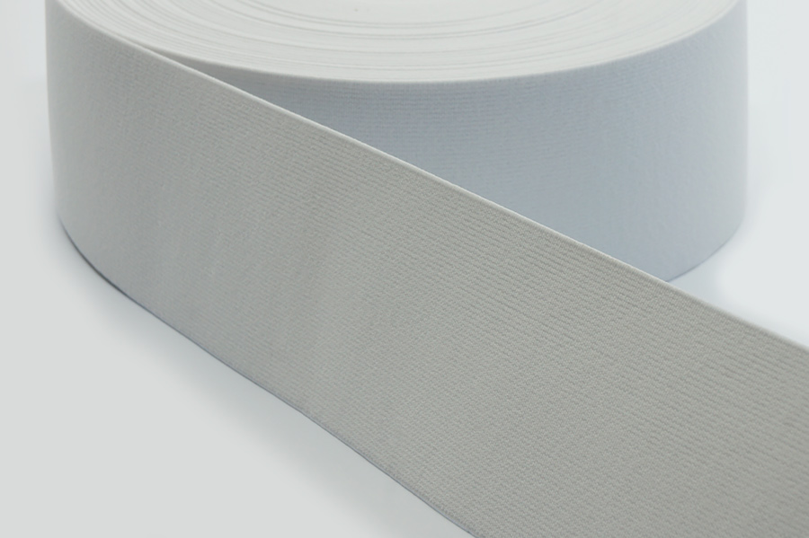 Тасьма еластична 70 мм Лента ткана білий