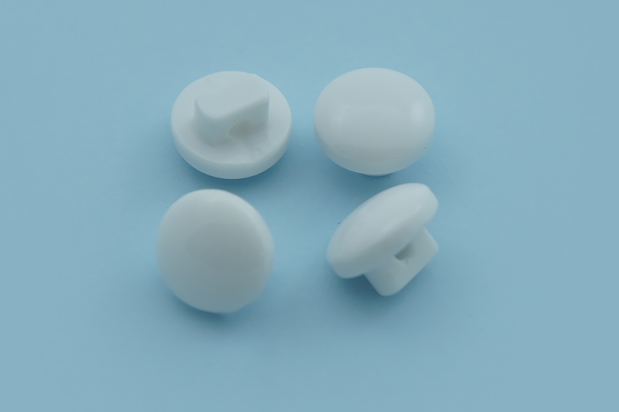 Гудзик на ніжці 10 мм Mertbutton однотонний білий 4023-16-999