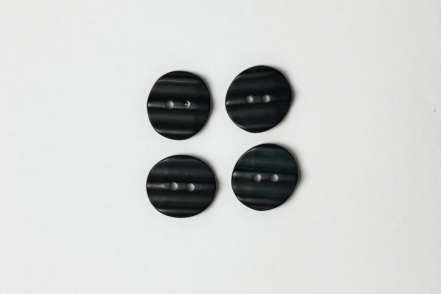 Гудзик 21 мм 2 отвори фактурний