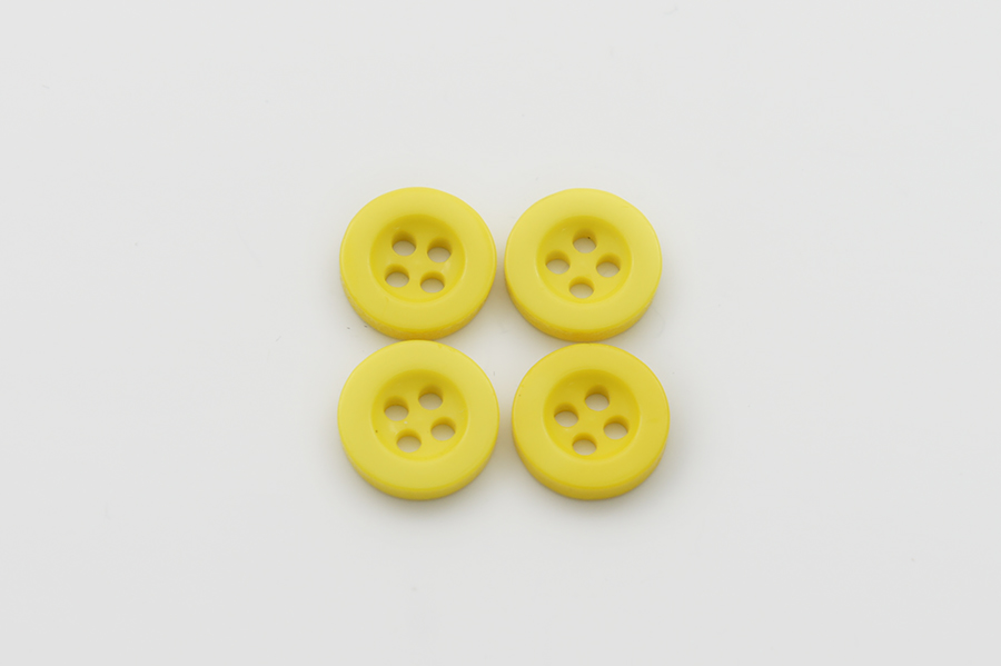 Гудзик 11 мм Mertbutton 4 отвори однотонний жовтий