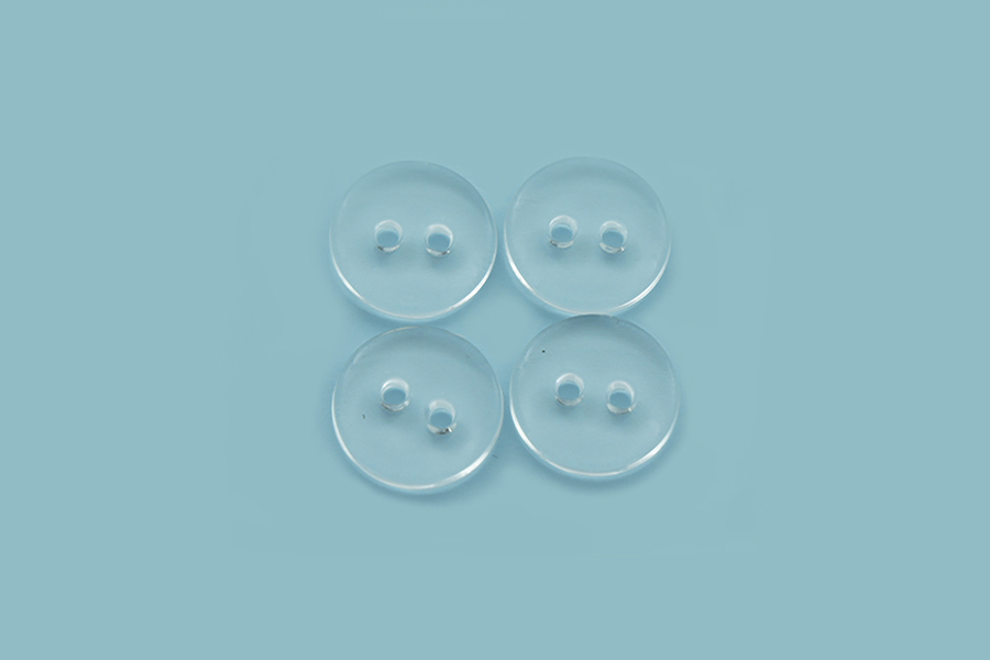 Гудзик 11 мм MH 2 отвори однотонний прозорий