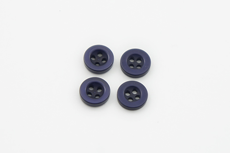 Гудзик 9 мм Mertbutton 4 отвори перламутр синій темний