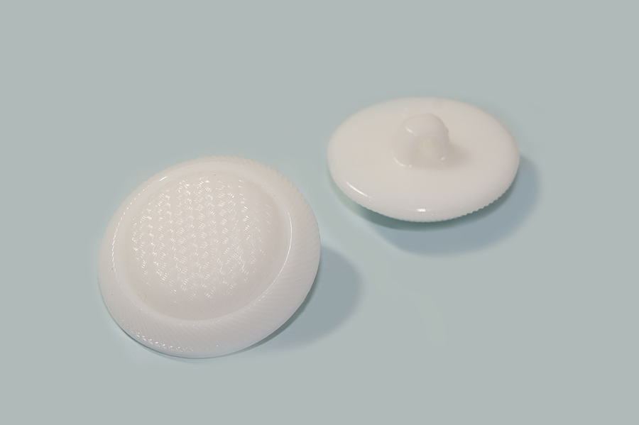 Гудзик на ніжці 25 мм Mertbutton фактурний білий 15-04-40-999