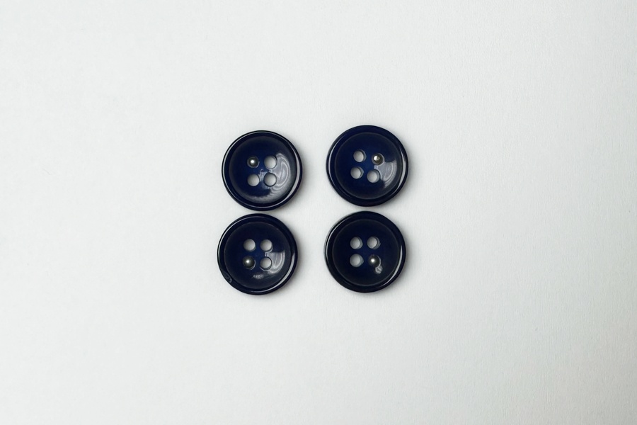 Гудзик 15 мм Mertbutton 4 отвори фактурний фіолетовий синій