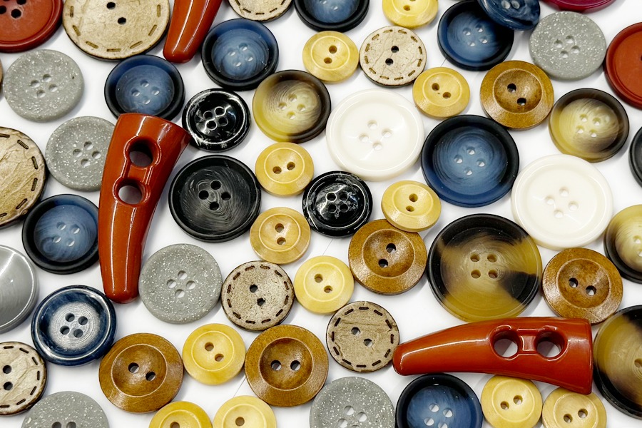 Ґудзики для костюмів і верхнього одягу