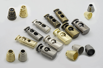 Наконечники та фіксатори для шнура